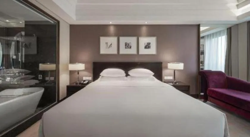 Bed in New Century Hangzhou Grand Hotel