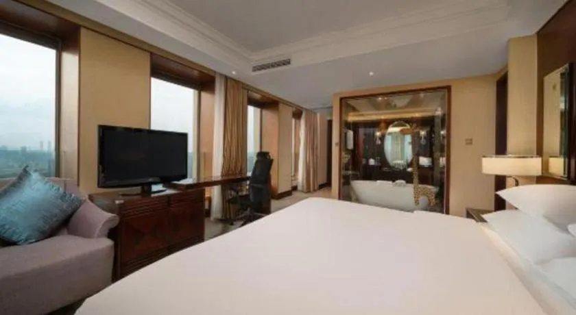 Bed in New Century Hangzhou Grand Hotel