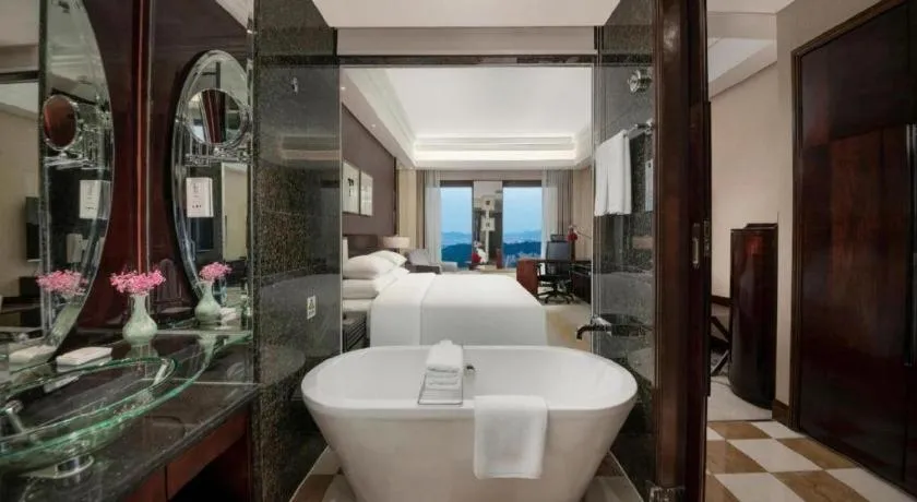 Bed in New Century Hangzhou Grand Hotel