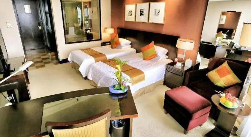 Bed in New Century Hangzhou Grand Hotel