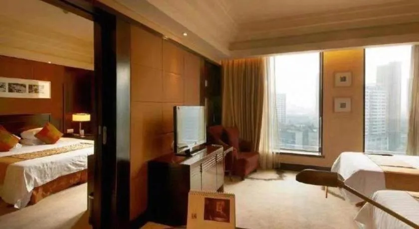 Bed in New Century Hangzhou Grand Hotel