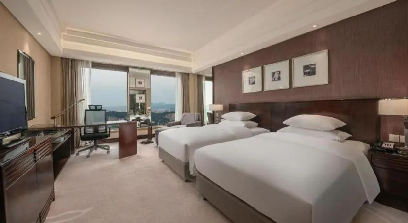 Bed in New Century Hangzhou Grand Hotel