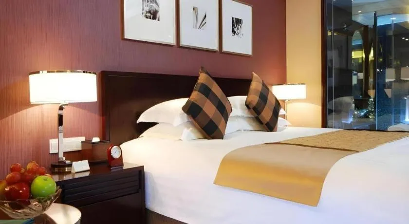 Bed in New Century Hangzhou Grand Hotel