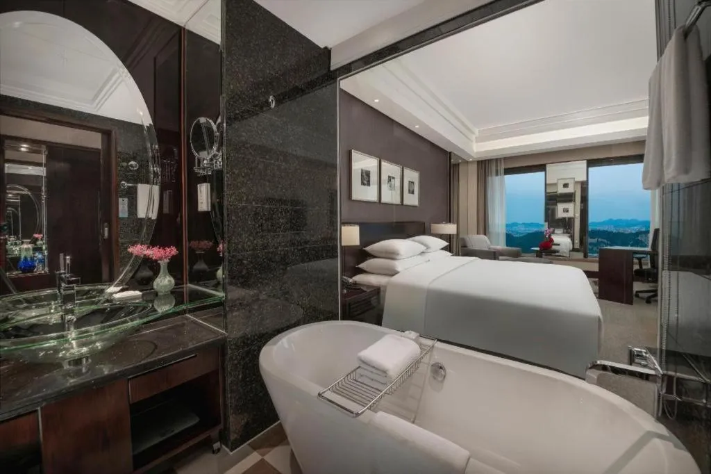 Bed in New Century Hangzhou Grand Hotel