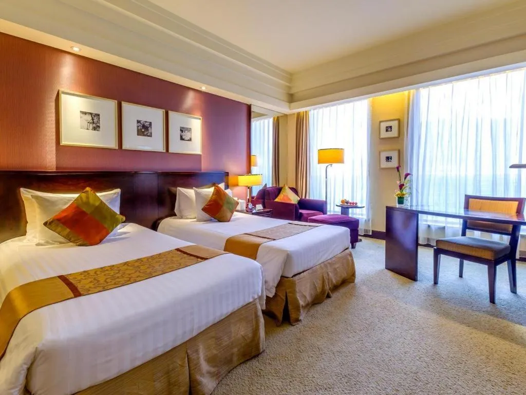 Bed in New Century Hangzhou Grand Hotel