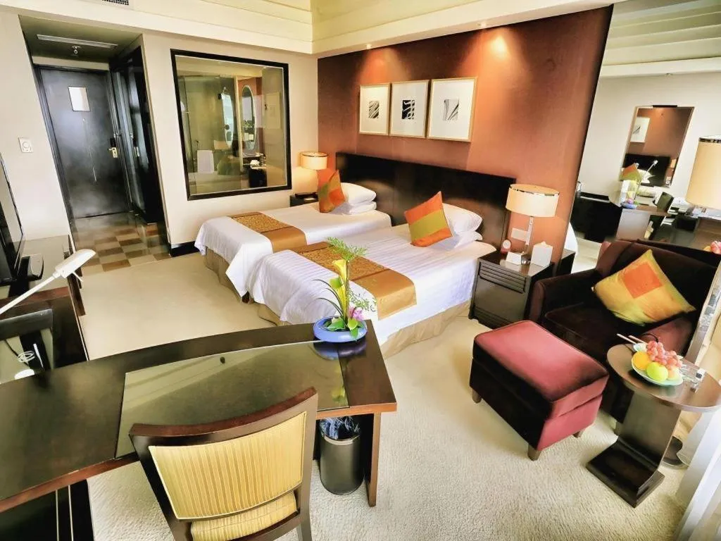 Bed in New Century Hangzhou Grand Hotel