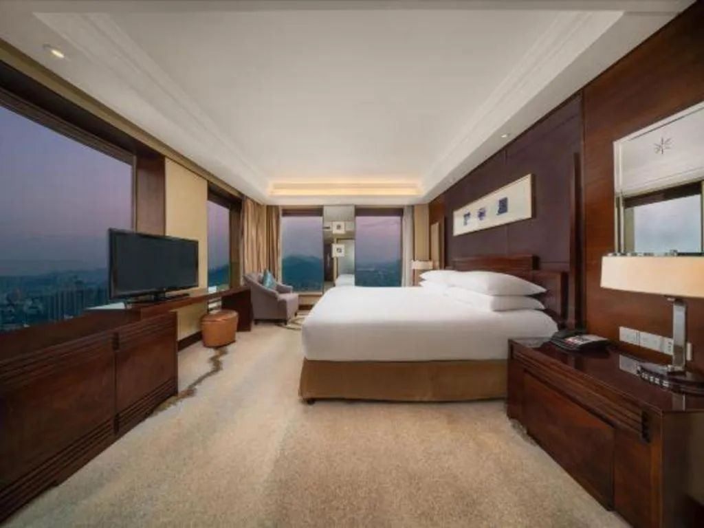 Bed in New Century Hangzhou Grand Hotel