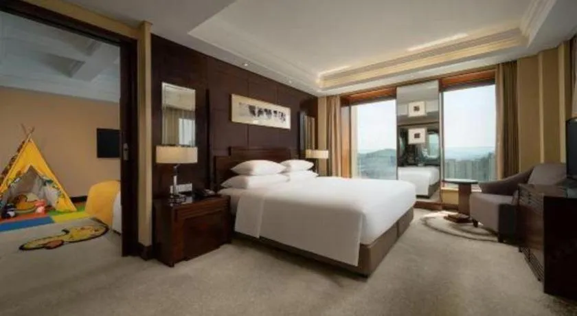 Bed in New Century Hangzhou Grand Hotel