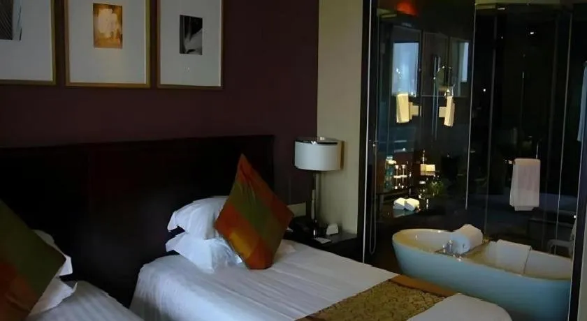 Bed in New Century Hangzhou Grand Hotel