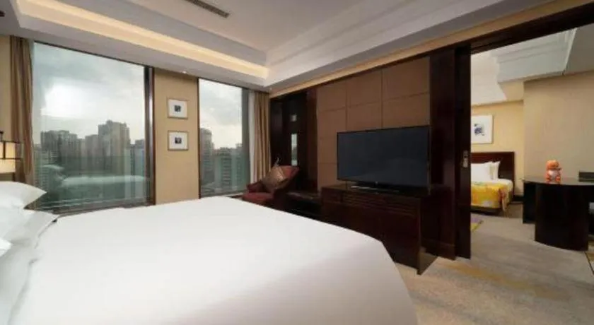 Bed in New Century Hangzhou Grand Hotel