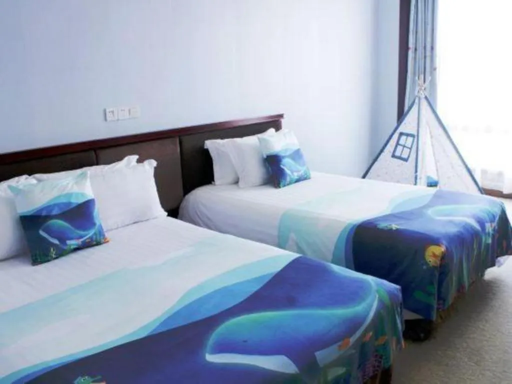 Bed in New Century Hotel Ninghai