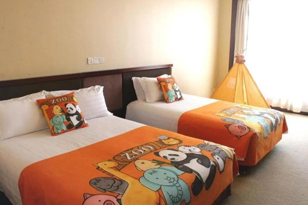 Bed in New Century Hotel Ninghai