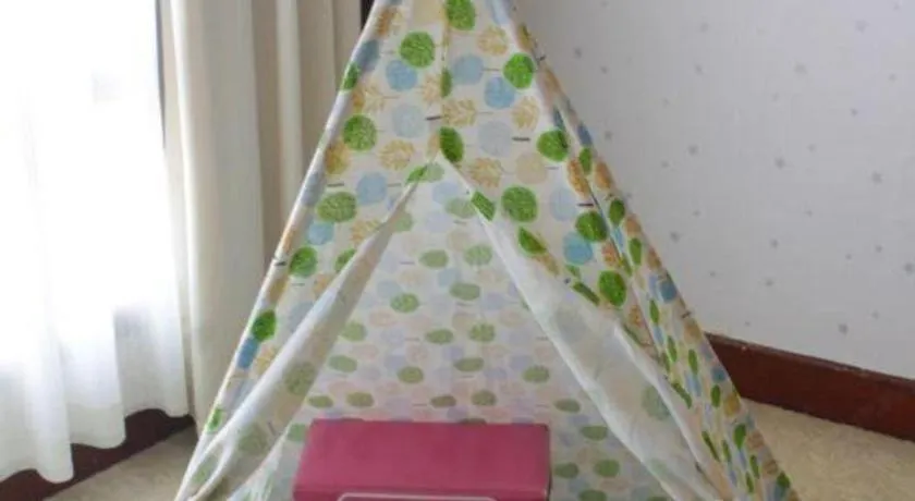 Bed in New Century Hotel Ninghai