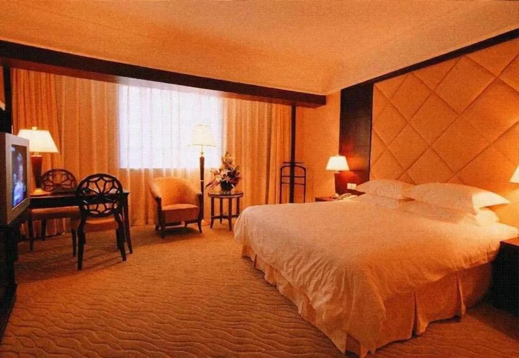 Bed in New Century Hotel Taizhou