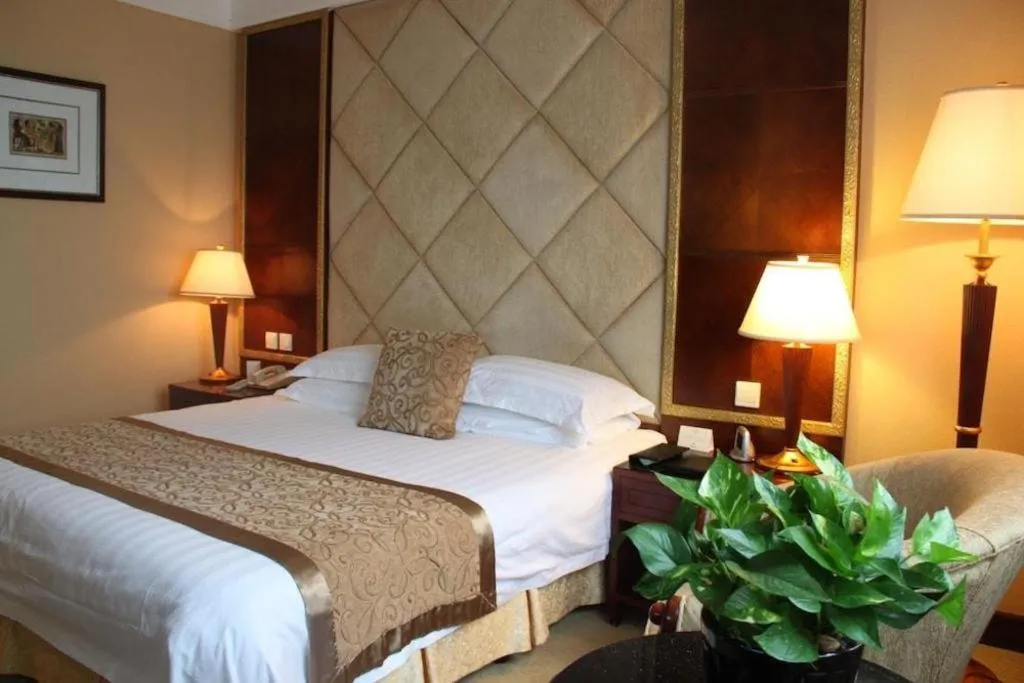 Bed in New Century Hotel Taizhou