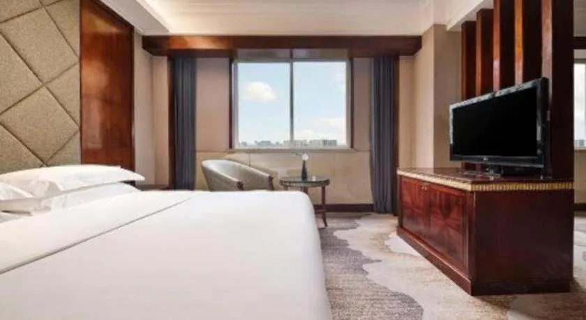Bed in New Century Hotel Taizhou