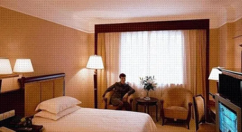 Bed in New Century Hotel Taizhou