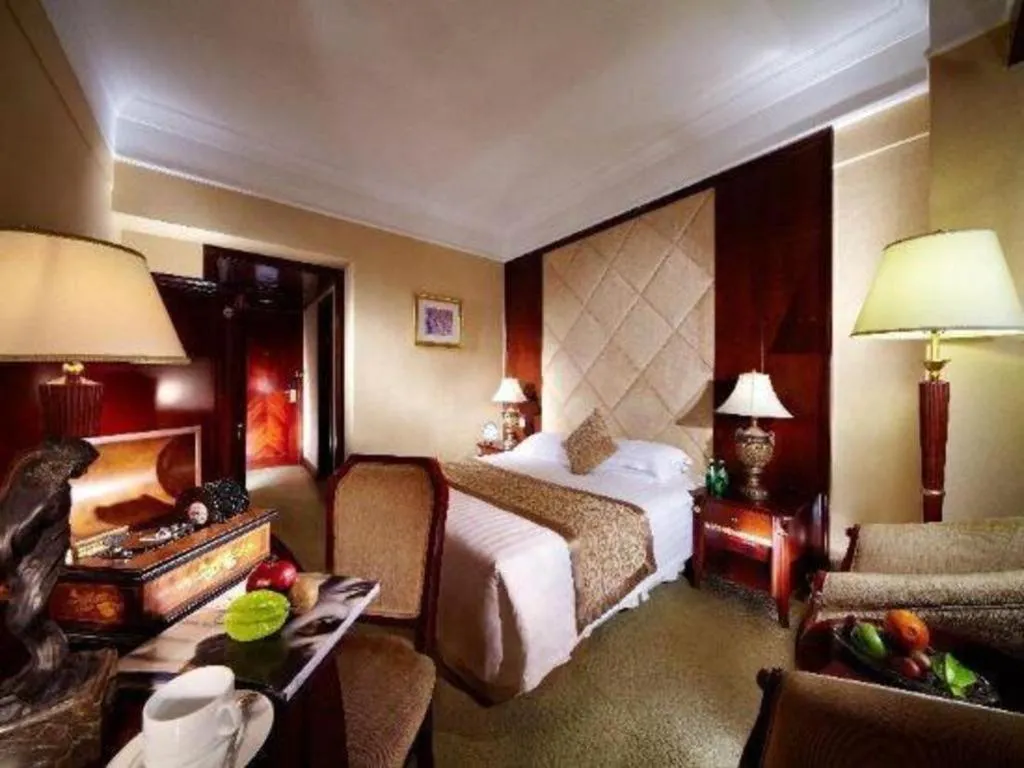 Bed in New Century Hotel Taizhou