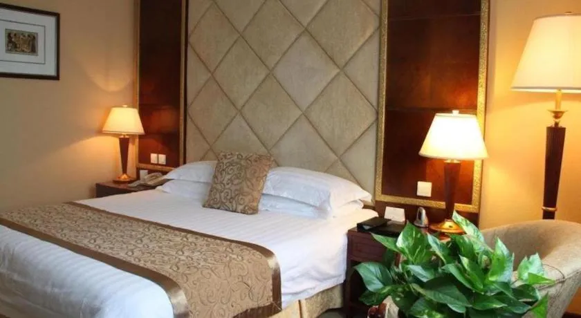 Bed in New Century Hotel Taizhou