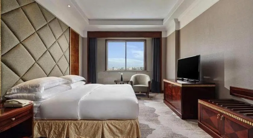 Bed in New Century Hotel Taizhou