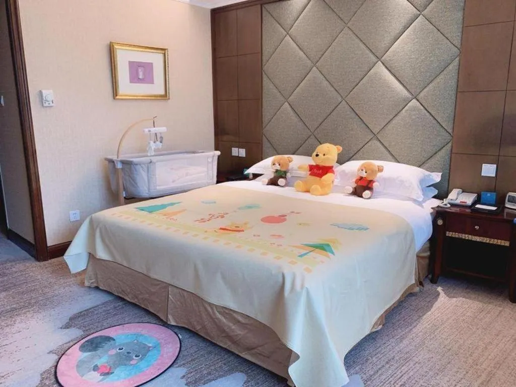 Bed in New Century Hotel Taizhou