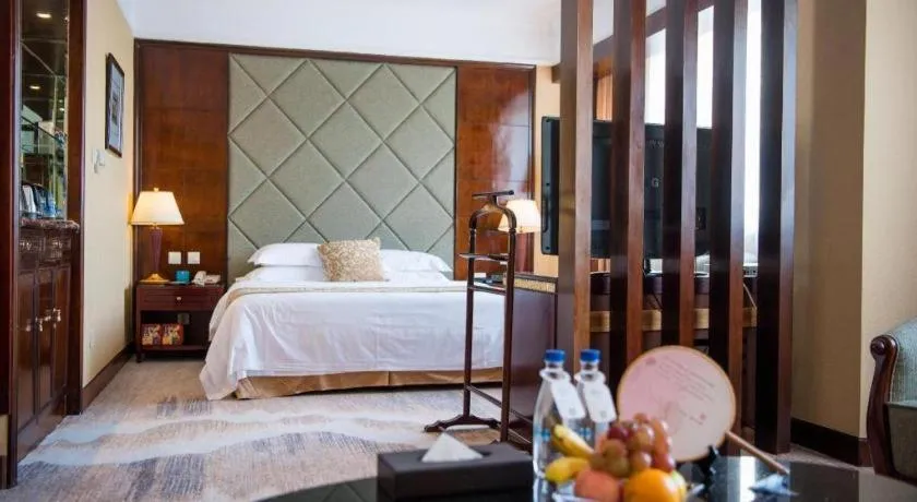 Bed in New Century Hotel Taizhou