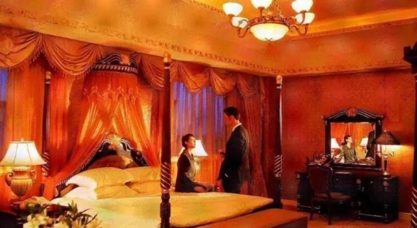 Bed in New Century Hotel Taizhou