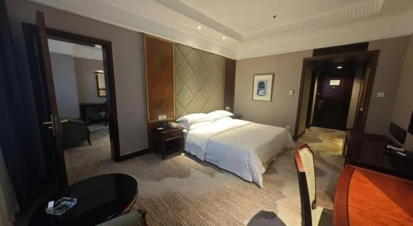 Bed in New Century Hotel Taizhou