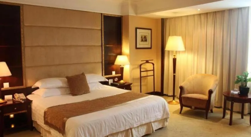 Bed in New Century Hotel Taizhou