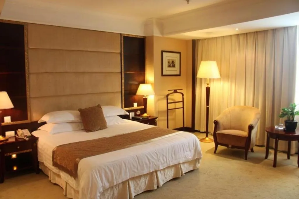 Bed in New Century Hotel Taizhou