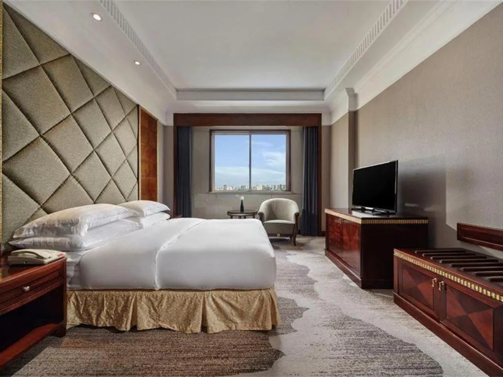 Bed in New Century Hotel Taizhou