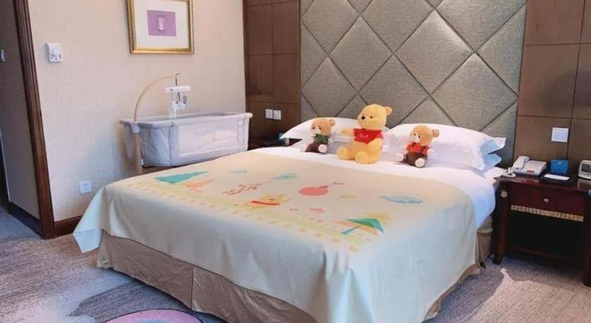 Bed in New Century Hotel Taizhou