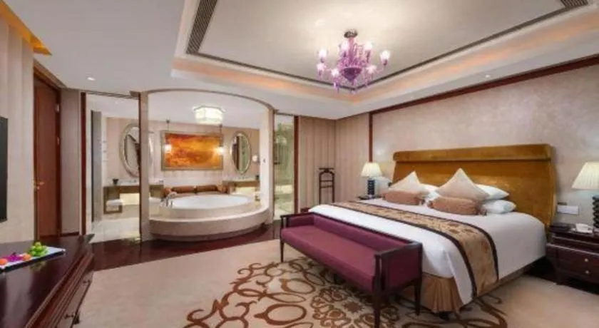 Bed in New Century Grand Changchun Hotel