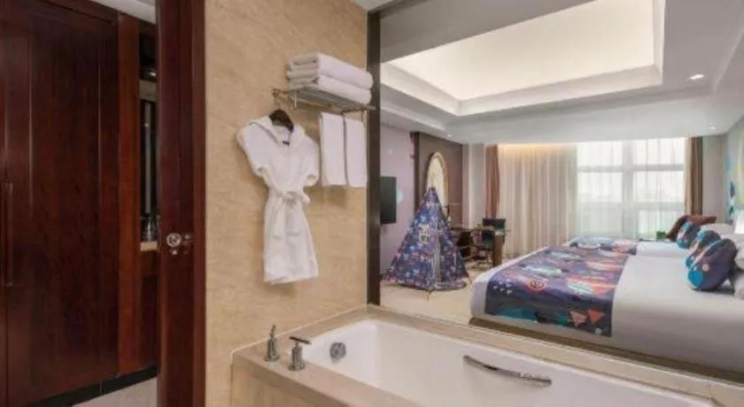 Bed in New Century Grand Changchun Hotel