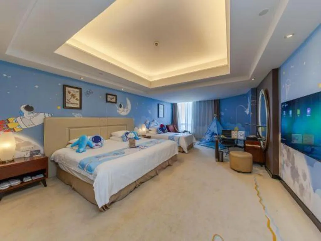 Bed in New Century Grand Changchun Hotel