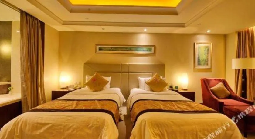 Bed in New Century Grand Changchun Hotel