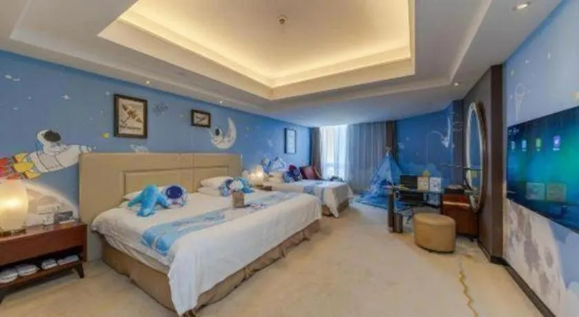 Bed in New Century Grand Changchun Hotel