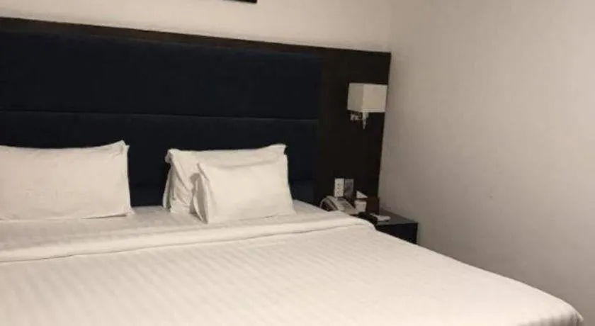 Bed in New Moon Hotel