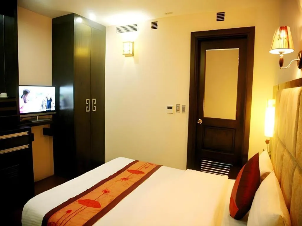 Bed in New Moon Hotel