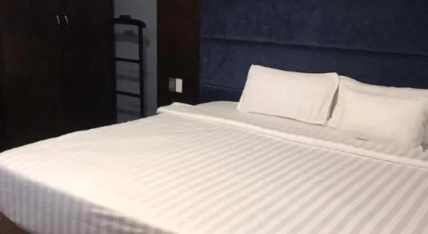 Bed in New Moon Hotel