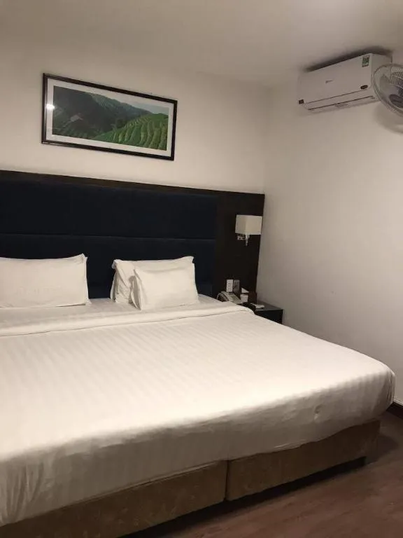 Bed in New Moon Hotel