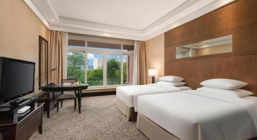 Bed in New Century Grand Hotel Xuzhou