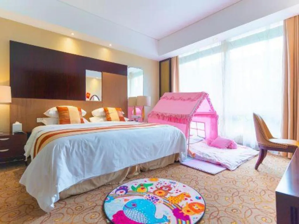 Bed in New Century Grand Hotel Xuzhou