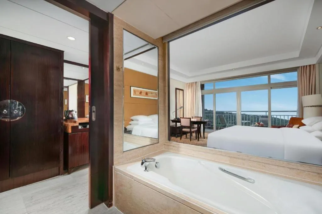 Bed in New Century Grand Hotel Xuzhou