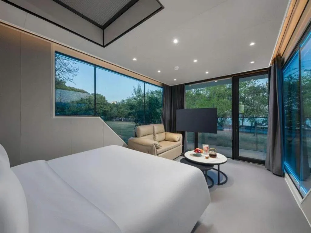 Bed in New Century Grand Hotel Xuzhou