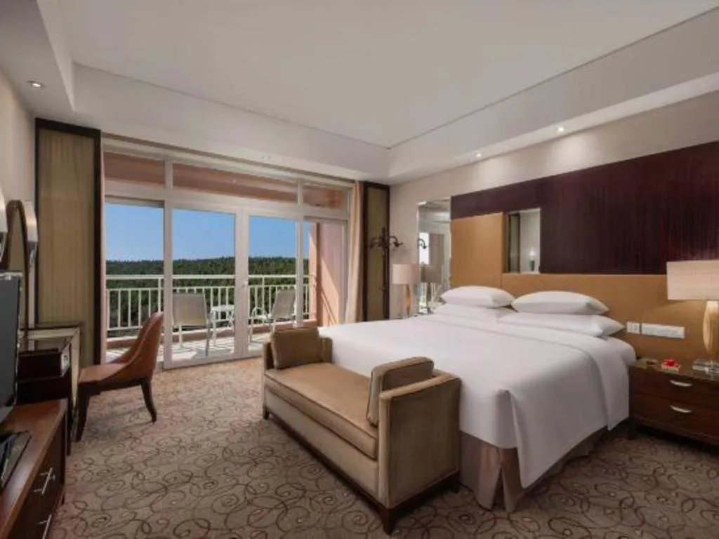 Bed in New Century Grand Hotel Xuzhou