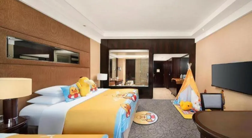 Bed in New Century Grand Hotel Xuzhou