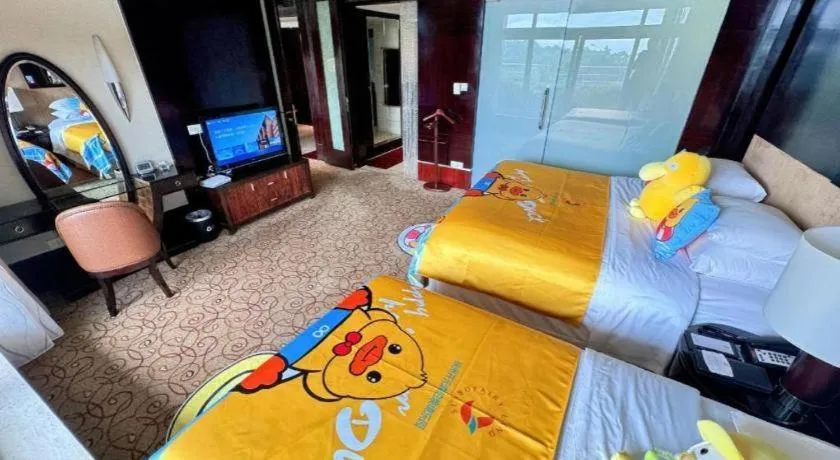 Bed in New Century Grand Hotel Xuzhou