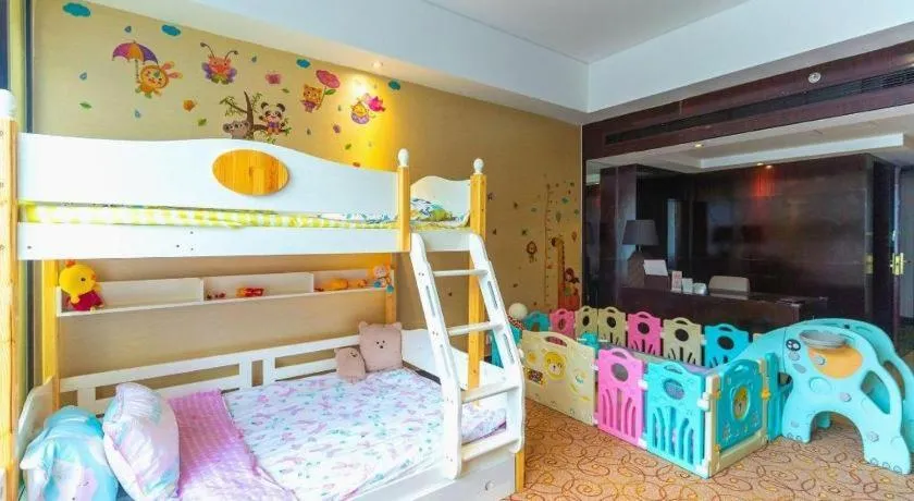 Bed in New Century Grand Hotel Xuzhou