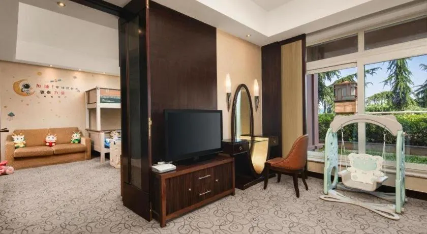 Bed in New Century Grand Hotel Xuzhou